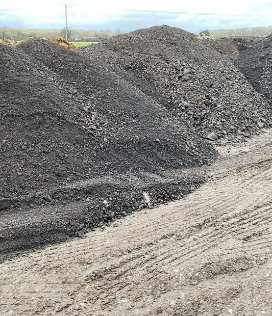 Pile of Gravel/Tarmac Planing